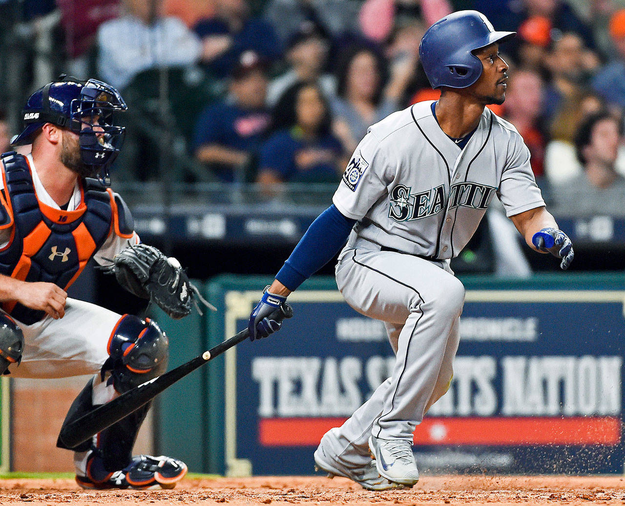 The Mariners’ Jarrod Dyson watches his go-ahead RBI single in the ninth inning of a game against the Astros on April 6, 2017, in Houston. (AP Photo/Eric Christian Smith)