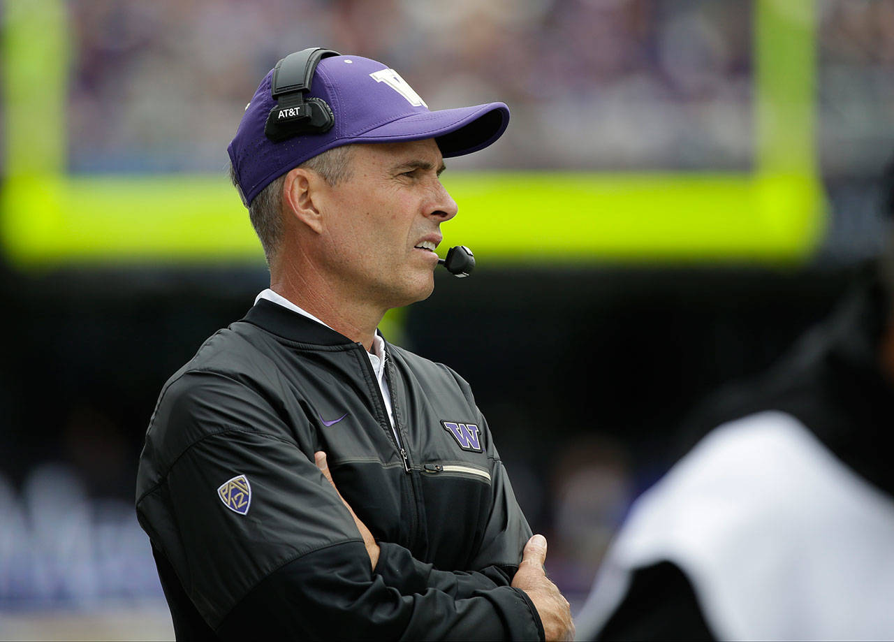 Washington head coach Chris Petersen looks on during a game against Rutgers on Sept. 3, 2016, in Seattle. (AP Photo/Elaine Thompson)