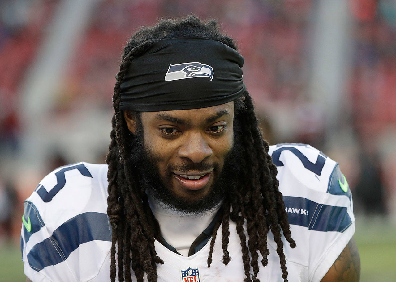 Seahawks cornerback Richard Sherman (25) on the sideline during a game against the 49ers on Jan. 1, 2017, in Santa Clara, Calif. (AP Photo/Marcio Jose Sanchez)