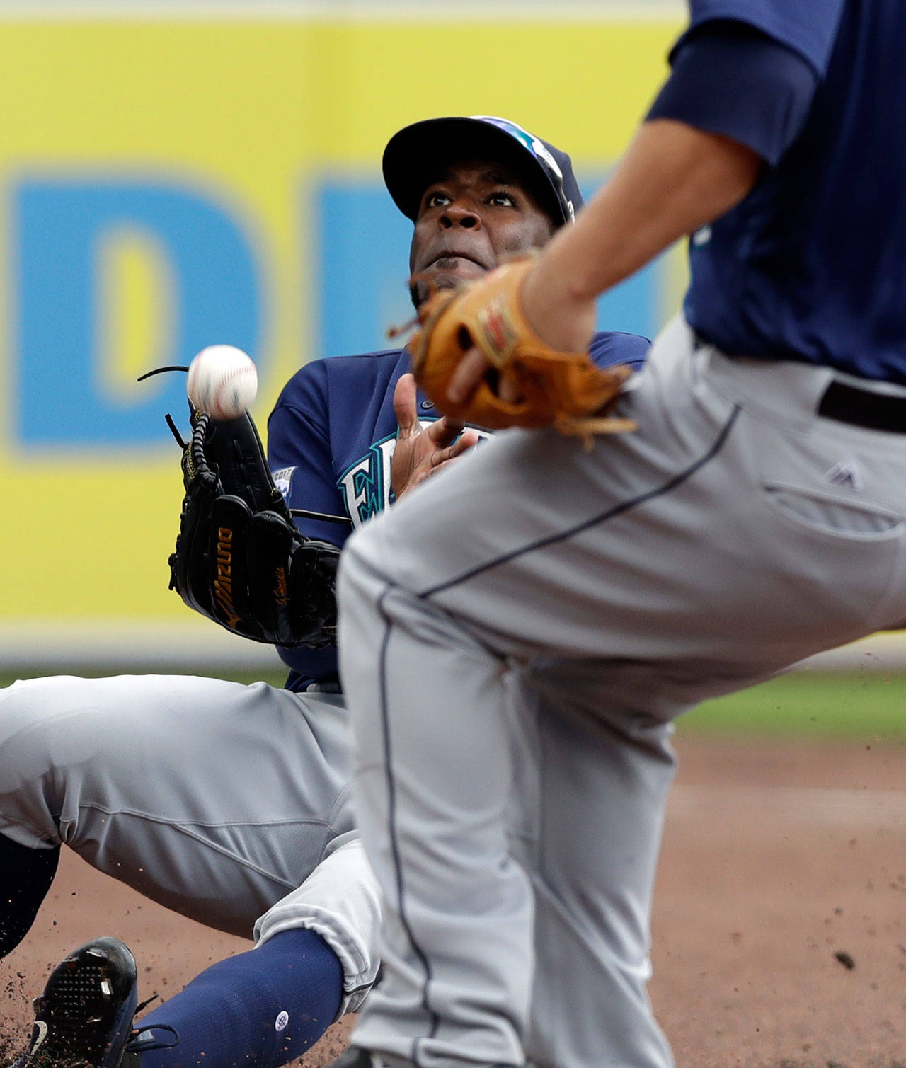 Seattle Mariners left fielder Guillermo Heredia makes a sliding catch of a popup hit by Detroit designated hitter Victor Martinez during the first inning of Thursday’s game in Detroit. Seattle won, 2-1 (AP Photo/Carlos Osorio)