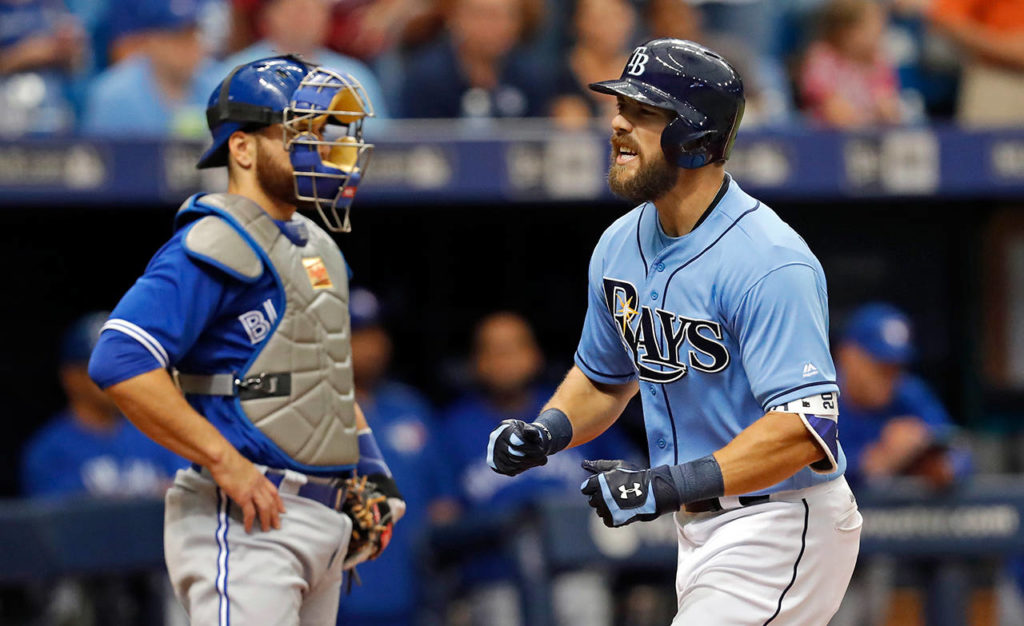 Tampa Bay Rays’ Steven Souza Jr., right, celebrates his home run in front of Toronto Blue Jays catcher Russell Martin during the third inning of a baseball game, Sunday, April 9, 2017, in St. Petersburg, Fla. (AP Photo/Mike Carlson)
