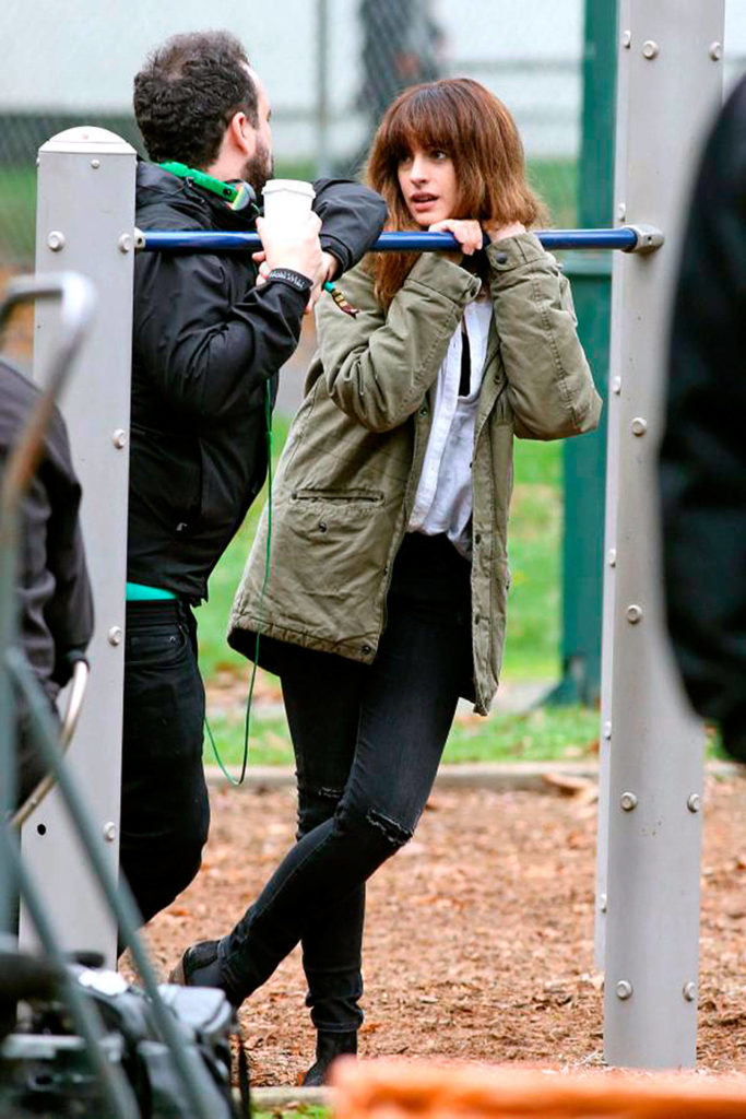Anne Hathaway on the set of “Colossal” with director Nacho Vigalondo. (Chris Helcermanas-Benge/TNS)

