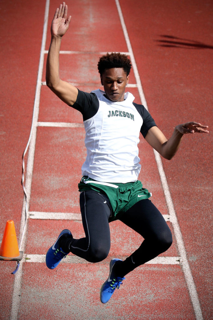 Jackson’s Islim Ouldtaki jumps during a Wesco 4A meet at Everett Memorial Stadium on Thursday. (Kevin Clark / The Herald)
