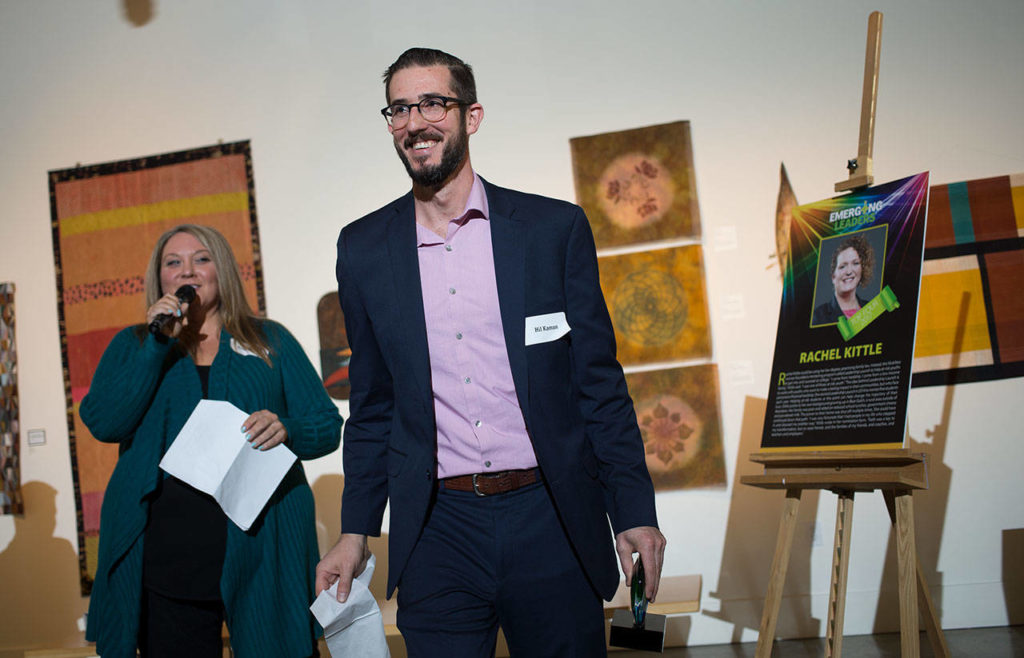 Hil Kaman, city of Everett’s public health and safety director, smiles after he is named the recipient of this year’s Emerging Leader award. (Andy Bronson / The Herald)
