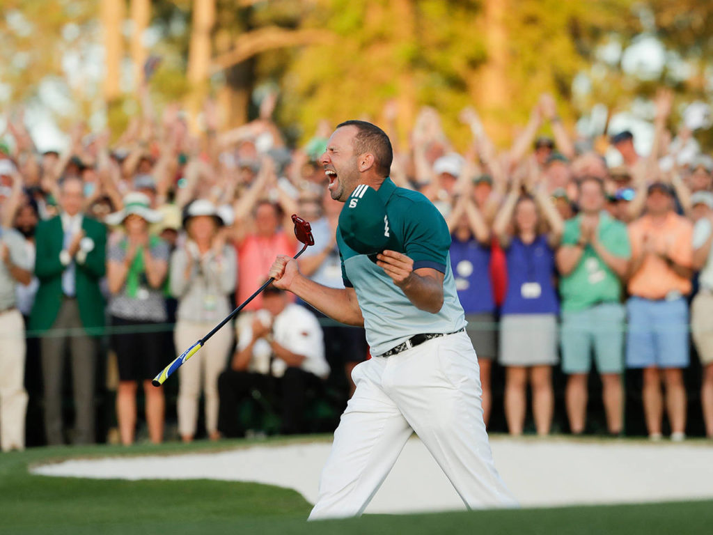 Sergio Garcia, of Spain, reacts after making his birdie putt on the 18th green to win the Masters golf tournament after a playoff Sunday, April 9, in Augusta, Ga. (AP Photo/Matt Slocum)

