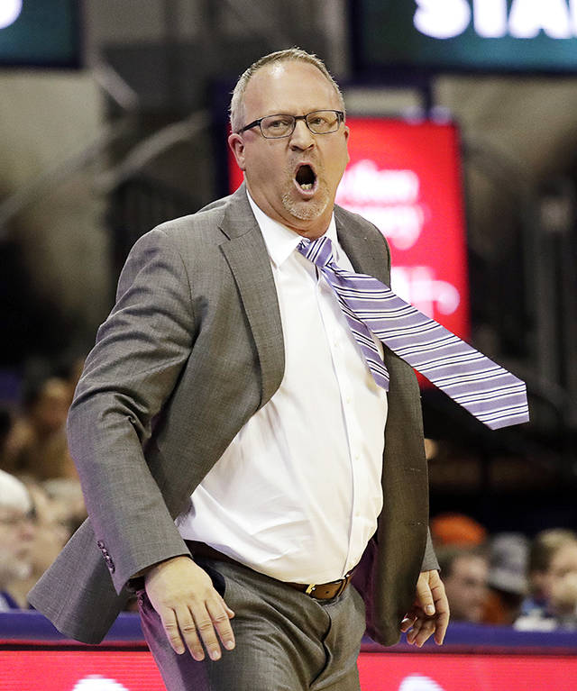 Washington head coach Mike Neighbors reacts to a call against his team in the second half of an NCAA college basketball game against Southern California on Jan. 6 in Seattle. (AP Photo/Elaine Thompson)