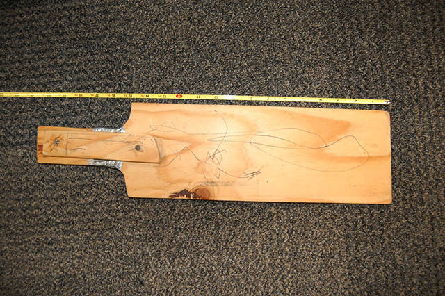 Monroe police arrested four people in a child-abuse case involving the use of a wooden paddle. (Monroe Police Department)