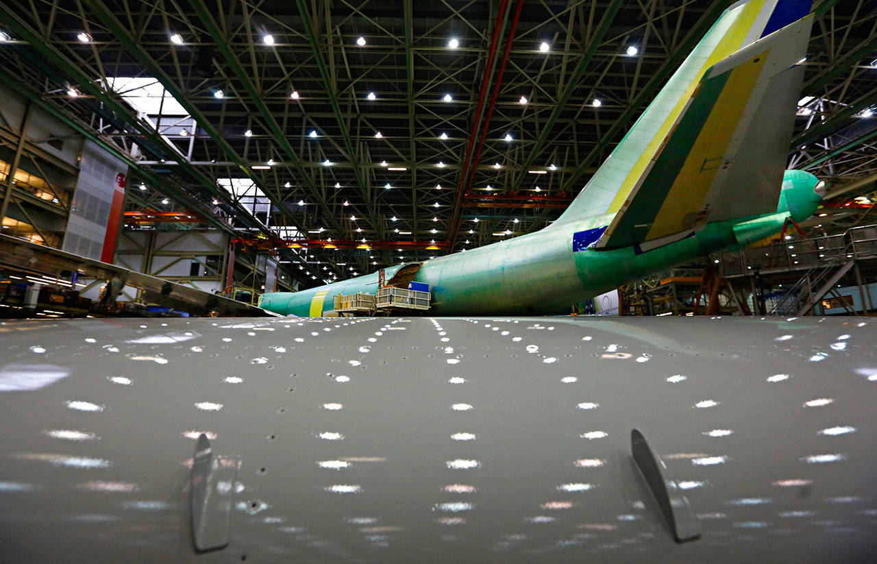 Work continues on a 747 in final assembly inside Boeing’s Everett facility in June, 2015. (Mark Mulligan/Herald file photo)