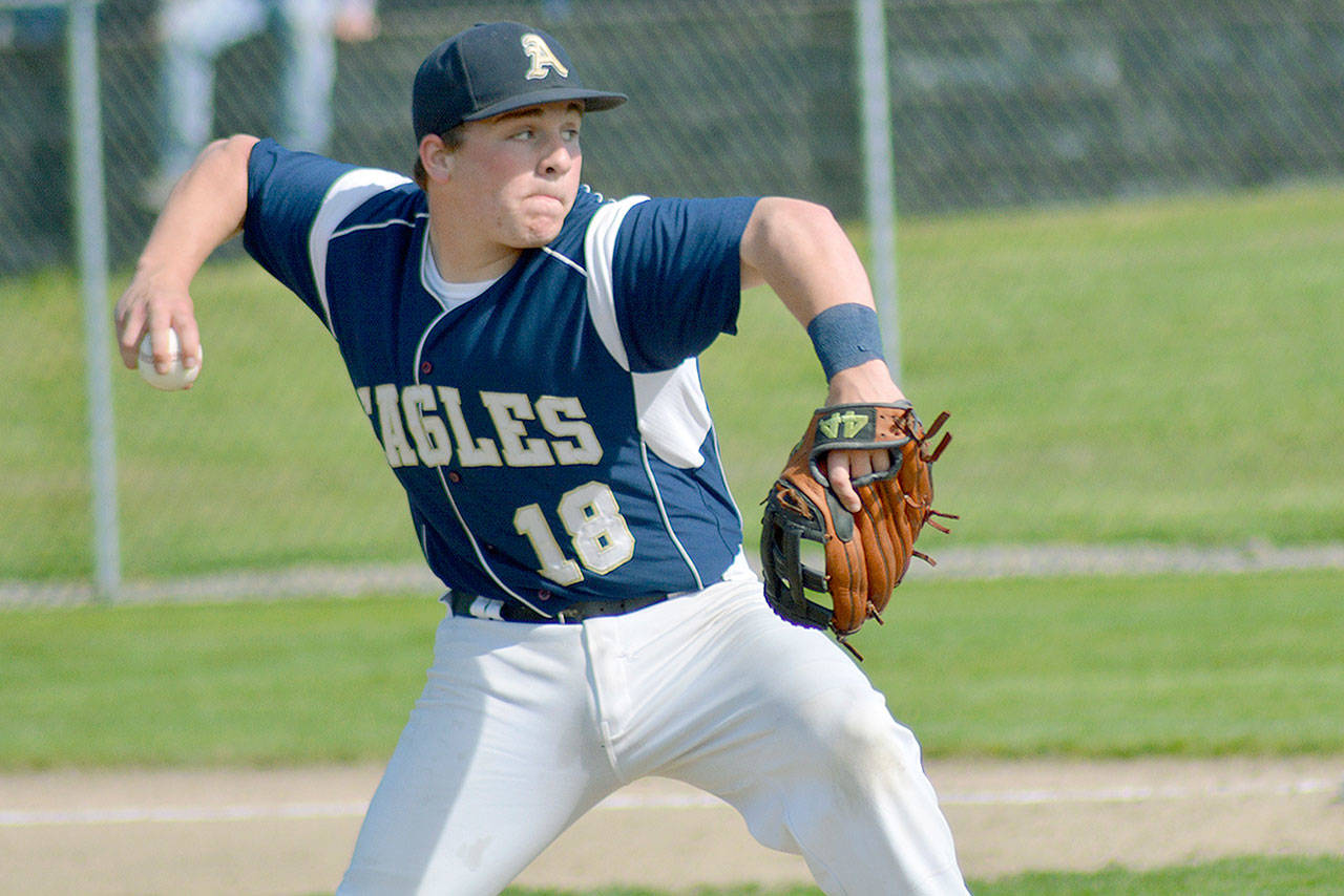 Arlington’s Tristan Sheward delivers against Ferndale in a 3A District 1 elimination game on Tuesday in Arlington. Sheward pitched a complete game as the Eagles won 5-1 to clinch a state tournament berth. (Steve Powell/For the Herald)