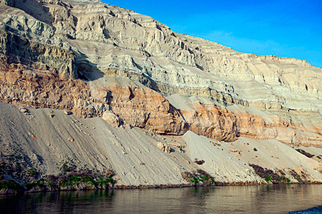 The White Bluffs of the Hanford Reach National Monument — 900 feet tall at their highest point — are composed of gravel, sand and silt deposited by ancient lakes, the Columbia River and its tributaries. (U.S. Fish and Wildlife Service / Dan Haas)
