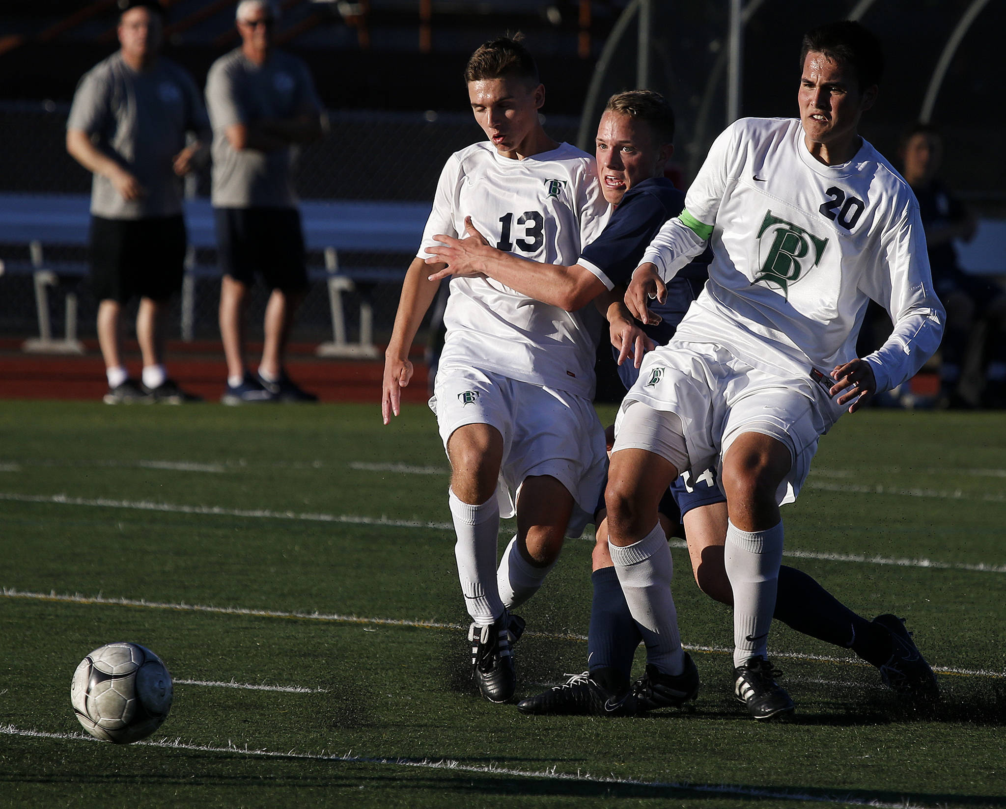 Glacier Peak’s Miles Johnston is sandwiched between Todd Beamer’s Adam Shown (left) and Luke Gregg (right) during a state 4A semifinal game at Sparks Stadium in Puyallup on Friday, May 26. After the two teams battled to a 2-2 draw in regulation, Todd Beamer won after a penalty shootout. (Ian Terry / The Herald)