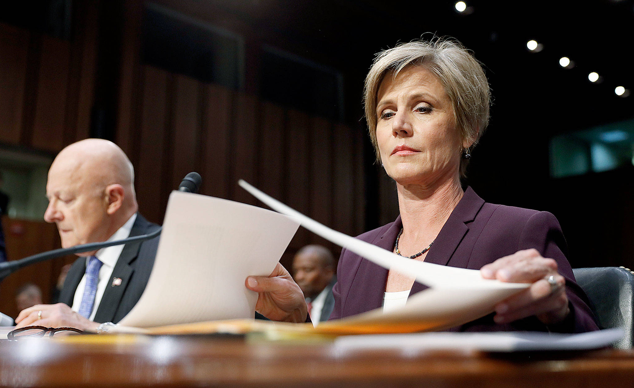 Former acting Attorney General Sally Yates (right) and former National Intelligence Director James Clapper prepare to testify on Capitol Hill in Washington on Monday before the Senate Judiciary subcommittee on Crime and Terrorism. (AP Photo/Carolyn Kaster)