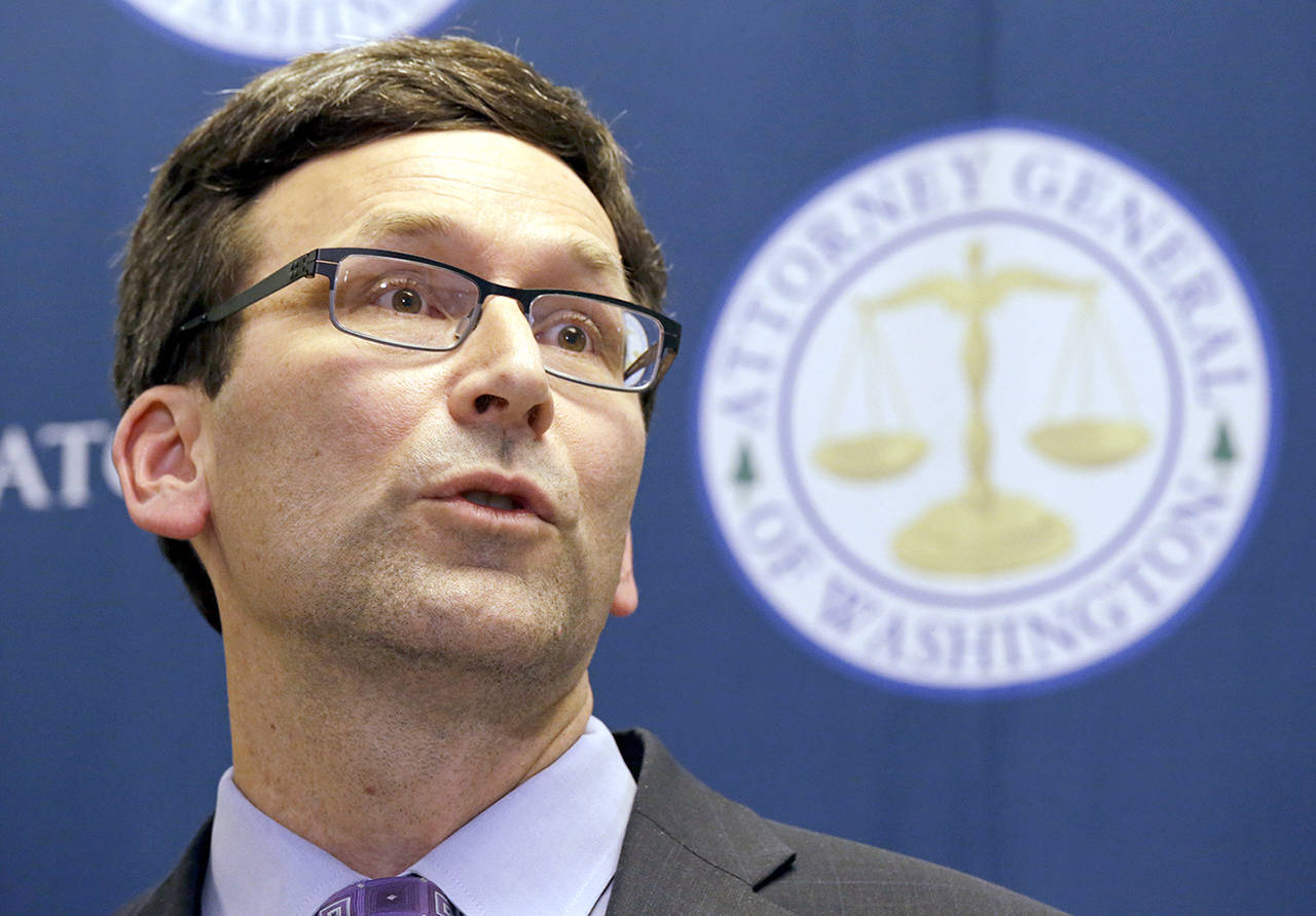 In this Feb. 9 photo, Washington Attorney General Bob Ferguson speaks at a news conference in Seattle. (AP Photo/Elaine Thompson, File)