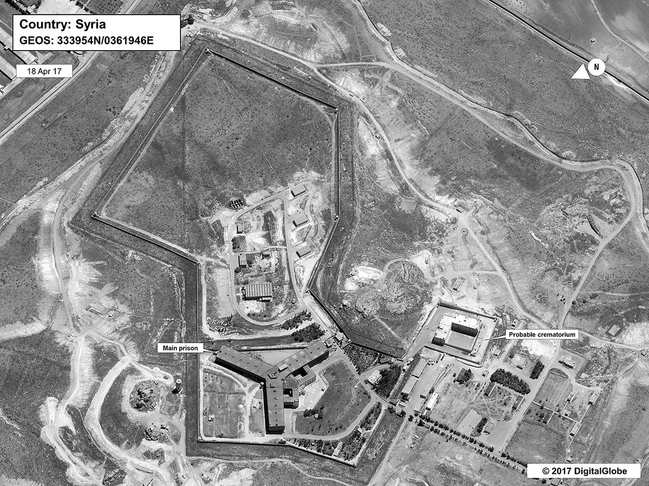 This April 18 satellite image shows what the State Department described as a building in a prison complex in Syria that was modified to support a crematorium. (State Department/DigitalGlobe via AP)