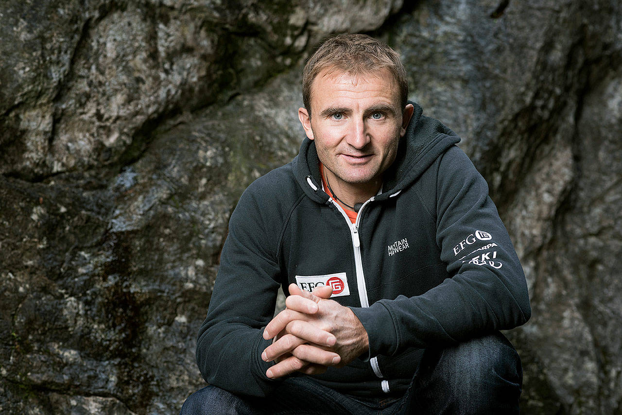 Swiss climber Ueli Steck poses at the foot of a climbing wall in Wilderswil, Canton of Berne, Switzerland, in 2015. (Christian Beutler/Keystone via AP)
