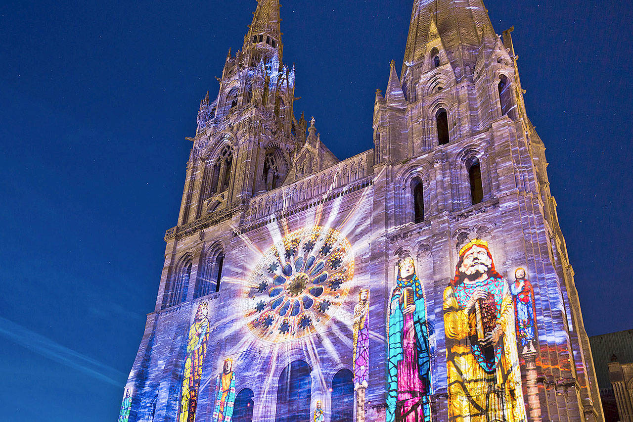 The town of Chartres is worth an overnight to take in its nighttime sound-and-light show, which incorporates 24 sites in an illuminated tour. (Rick Steves’ Europe)