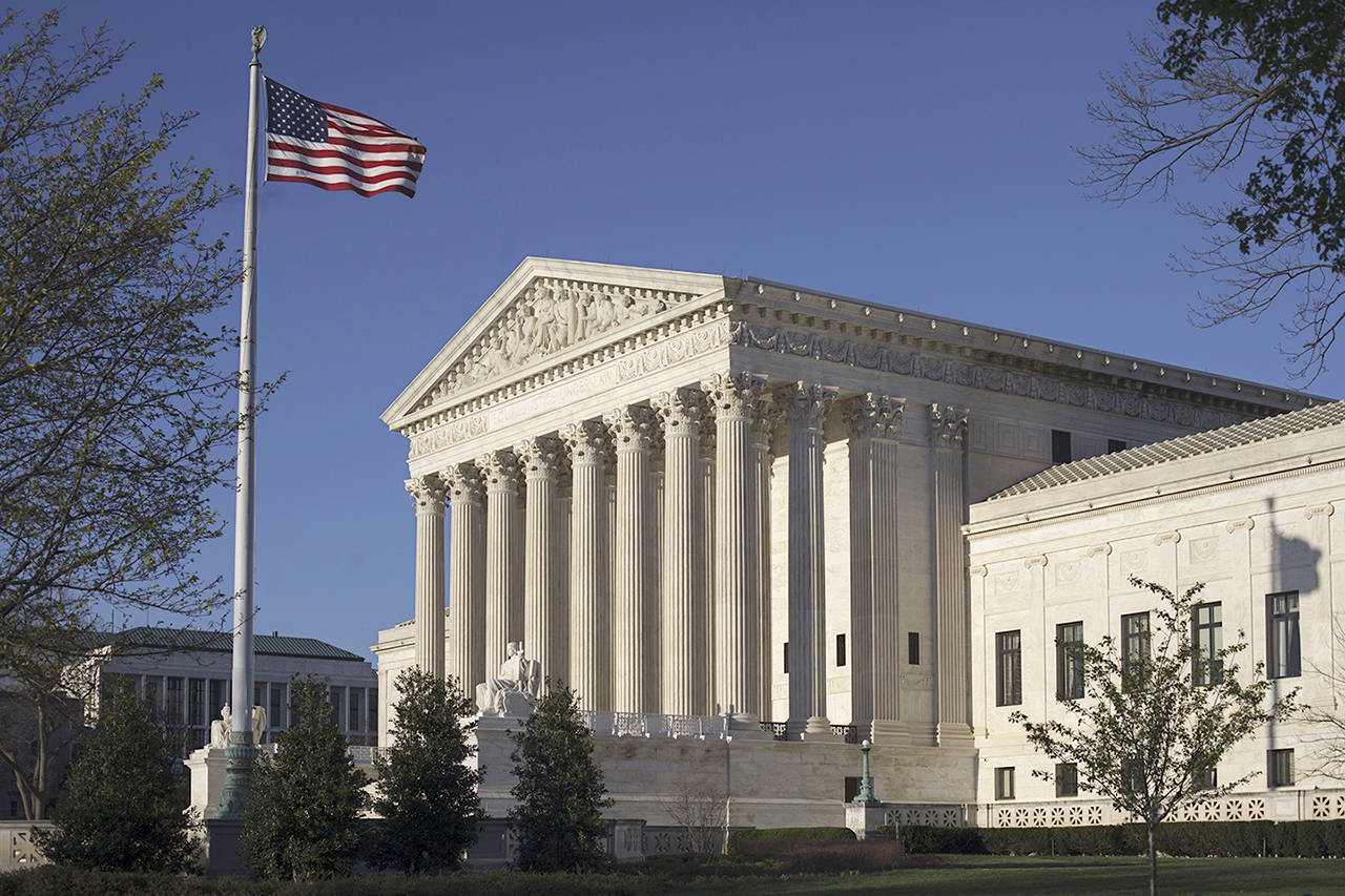 In this April 4 photo, the Supreme Court Building is seen in Washington. The Supreme Court struck down two congressional districts in North Carolina on Monday, May 22, because race played too large a role in their creation, a decision voting rights advocates said would boost challenges in other states. (AP Photo/J. Scott Applewhite)
