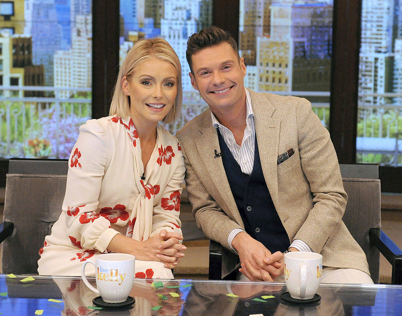 A new era in daytime television began Monday when Kelly Ripa introduced Ryan Seacrest as the permanent co-host joining her on “Live.” (Disney-ABC Home Entertainment)