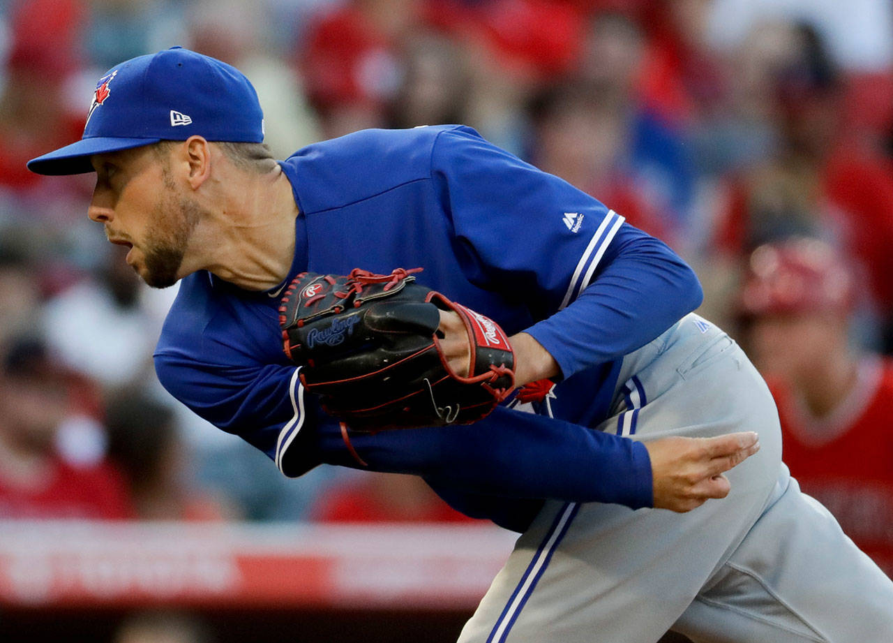 Pitcher Casey Lawrence throws for the Blue Jays during a game against the Angels on April 22, 2017, in Anaheim, Calif. The Mariners acquired Lawrence in a waiver claim on May 11, 2017. (AP Photo/Chris Carlson)