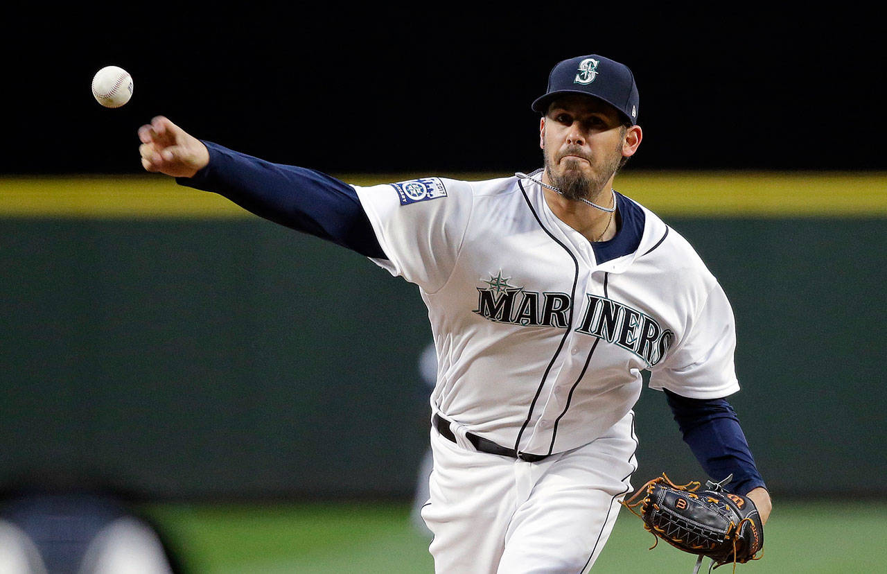 Mariners starting pitcher Christian Bergman throws to an Athletics batter during the fifth inning of a game May 17, 2017, in Seattle. (AP Photo/Elaine Thompson)