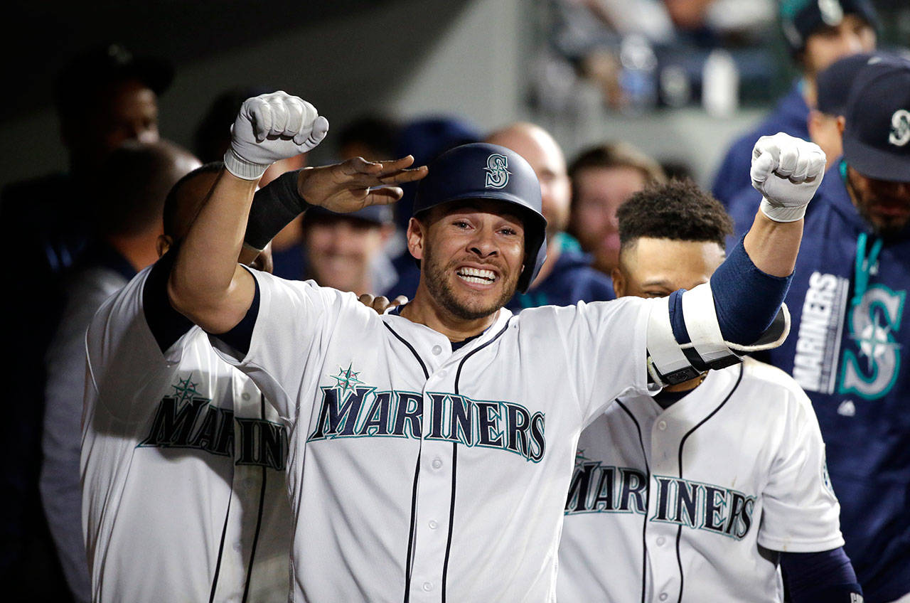 The Mariners’ Danny Valencia celebrates his solo home run against the Angels in the sixth inning of a game May 2, 2017, in Seattle. (AP Photo/Elaine Thompson)