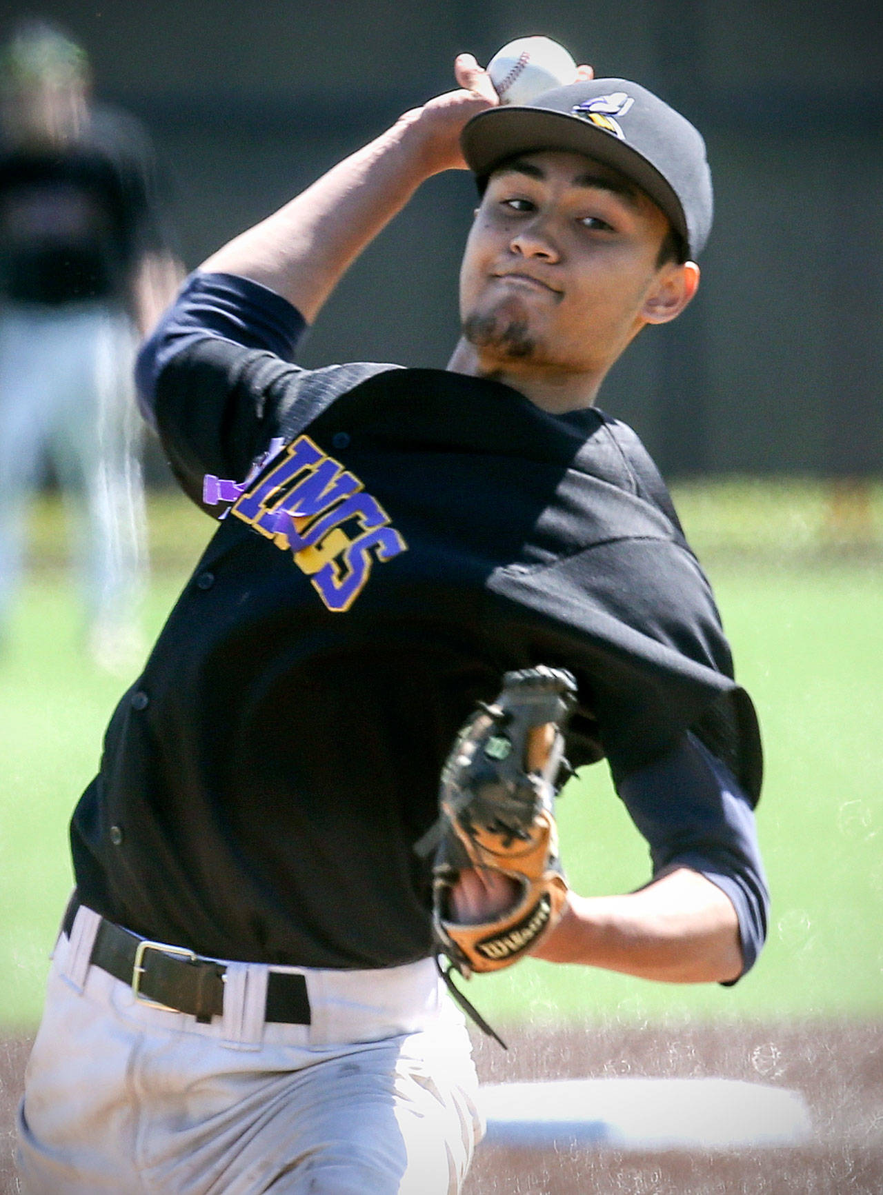 Lake Stevens’ Connor Olmstead throws a pitch during a playoff game against Monroe on May 6, 2017, in Monroe. Lake Stevens won 2-0. (Kevin Clark / The Herald)
