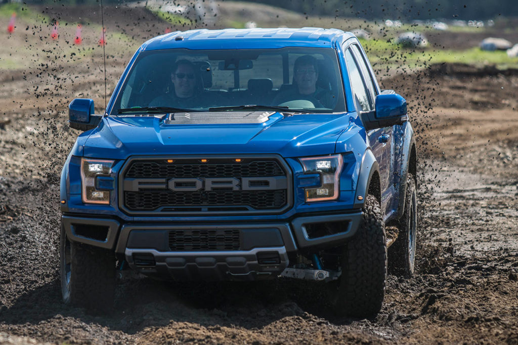 The 2017 Ford Raptor Super Cab churns through the terrain at The Ridge Motorsports Park during Mudfest. Hosted by the Northwest Automotive Press Association, the truck was voted the best pickup at the event. (Josh Mackey / NWAPA)
