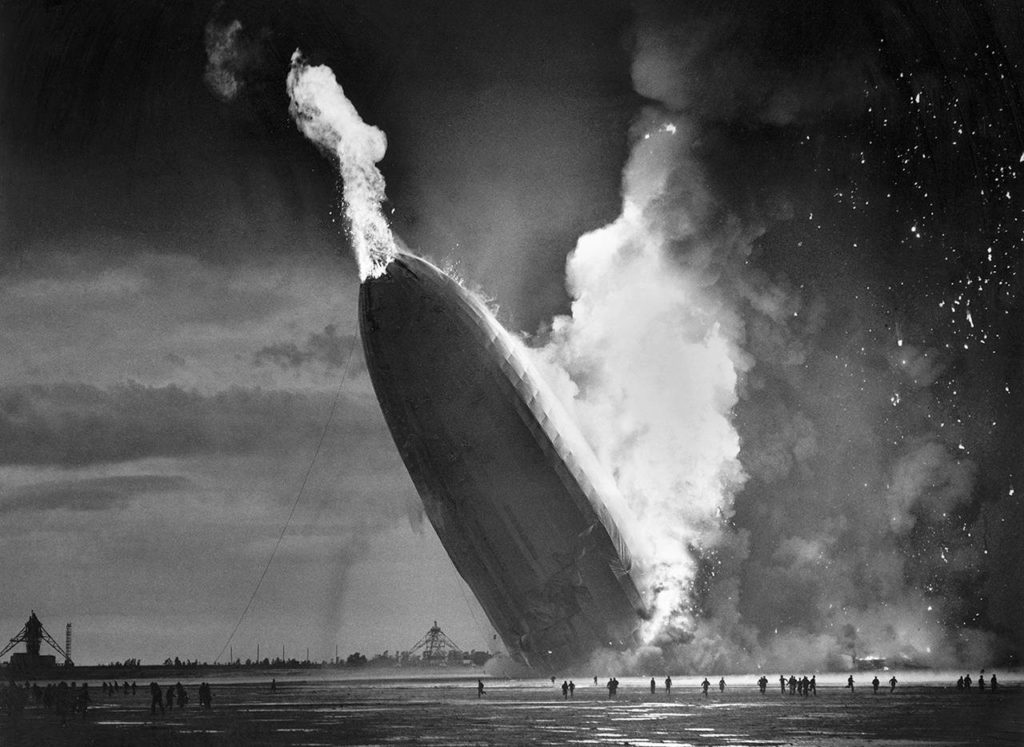 In this May 6, 1937 photo, the German dirigible Hindenburg crashes to earth in flames after exploding at the U.S. Naval Station in Lakehurst, New Jersey. (AP Photo/Murray Becker, File)
