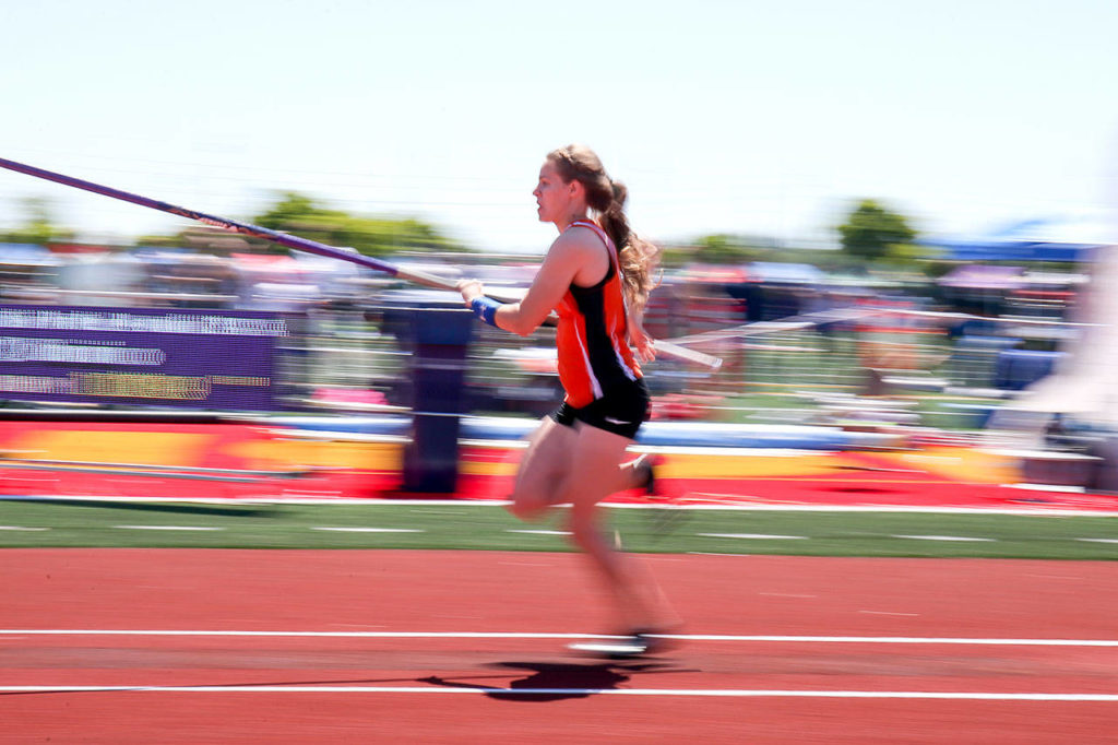 Kevin Clark / The Herald
Kelsey Bassett of Granite Falls runs down the runway for the pole vault Friday at the Class 2A state track and field championships at Mount Tahoma High School. Bassett finished second in the event.
