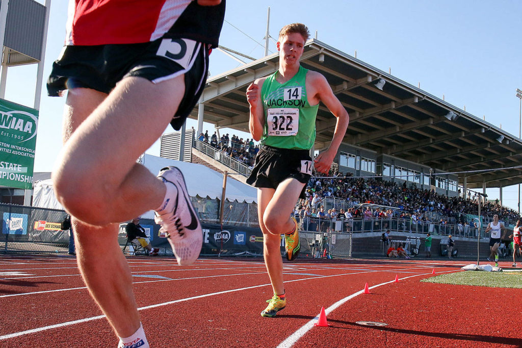 Jackson’s Matthew Watkins trails Camas’ Daniel Maton in the 1,600 meters to finish second during the state track and field championships on May 25, 2017, at Mount Tahoma High School. (Kevin Clark / The Herald)
