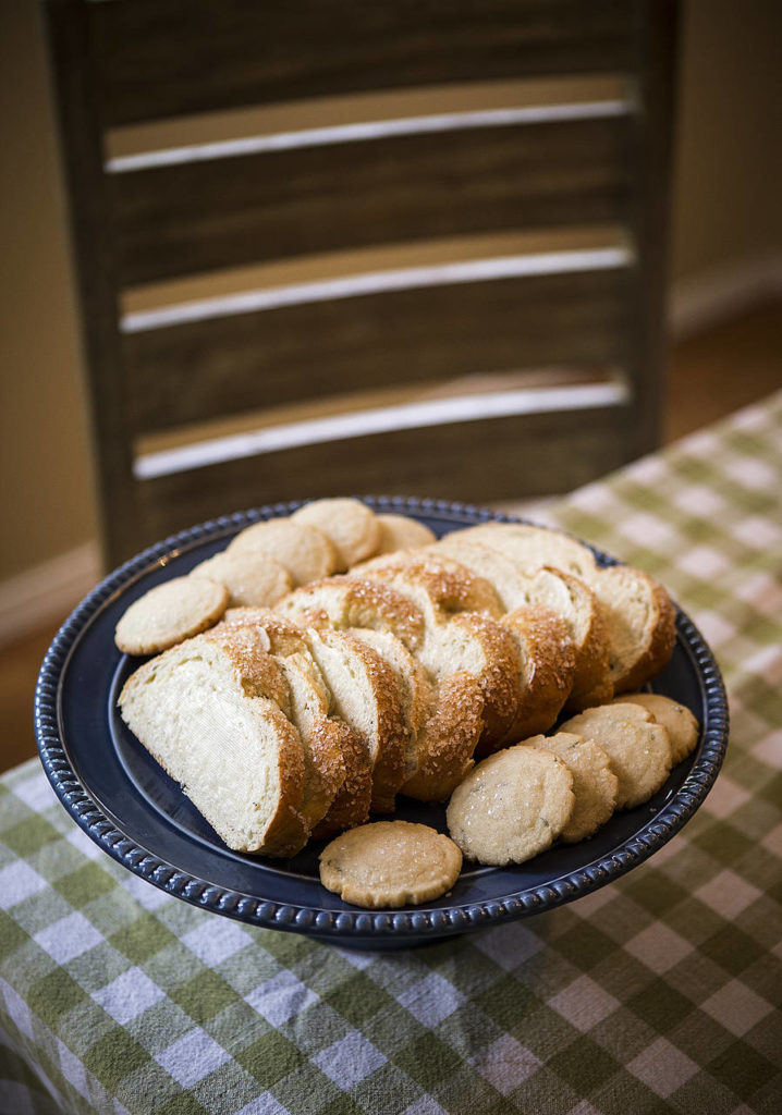 Sliced cardamom bread and lemon-rosemary cookies. (Ian Terry / The Herald)

