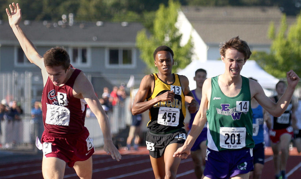 Mount Spokane’s Hayden Dressel (left) takes first in front of Edmonds-Woodway’s Matthew Park (right) and Lincoln’s James Mwaura in the 1,600 meters during the state track and field championships on May 25, 2017, at Mount Tahoma High School. (Kevin Clark / The Herald)
