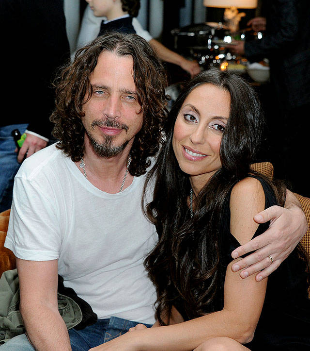 Chris Cornell (left) and his wife, Vicky Karayiannis, in 2012. (AP Photo/Katy Winn, File)