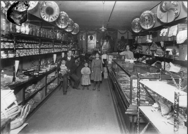 A portrait of the Chinese Kan family inside their Hewitt Avenue business, the Japan Bazaar, circa 1907. (Everett Public Library photo)