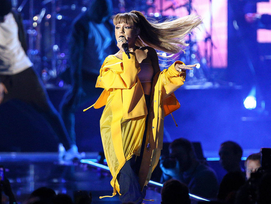 In this Sept. 24, 2016, photo, Ariana Grande performs at the iHeartRadio Music Festival in Las Vegas. (Photo by John Salangsang / Invision)
