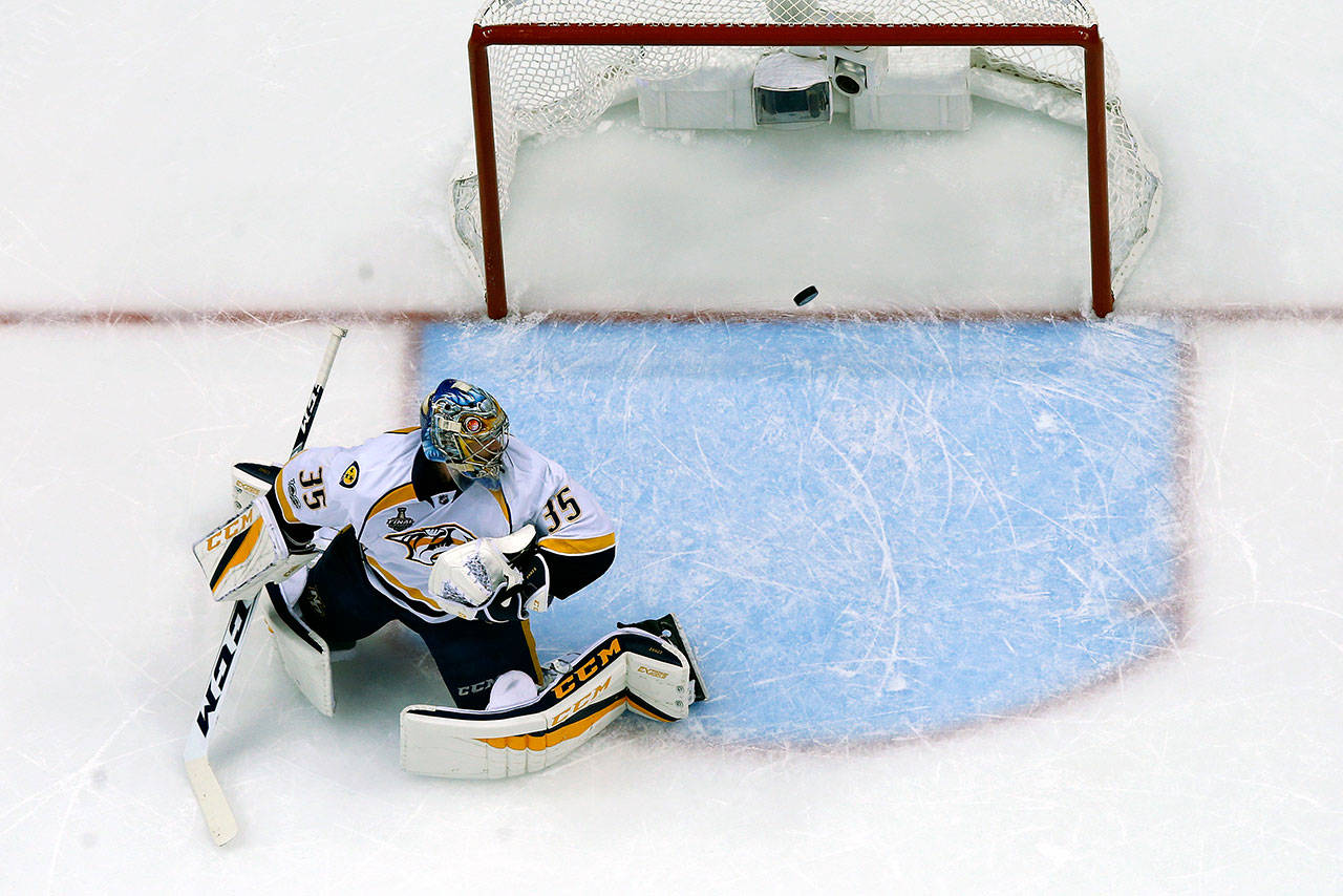 A shot by Pittsburgh’s Evgeni Malkin gets past Nashville goalie Pekka Rinne (35) during Game 5 of the Stanley Cup finals on Thursday in Pittsburgh. Rinne will have to be better if the Predators are going to win Game 6 on Sunday. (AP Photo/Gene J. Puskar)
