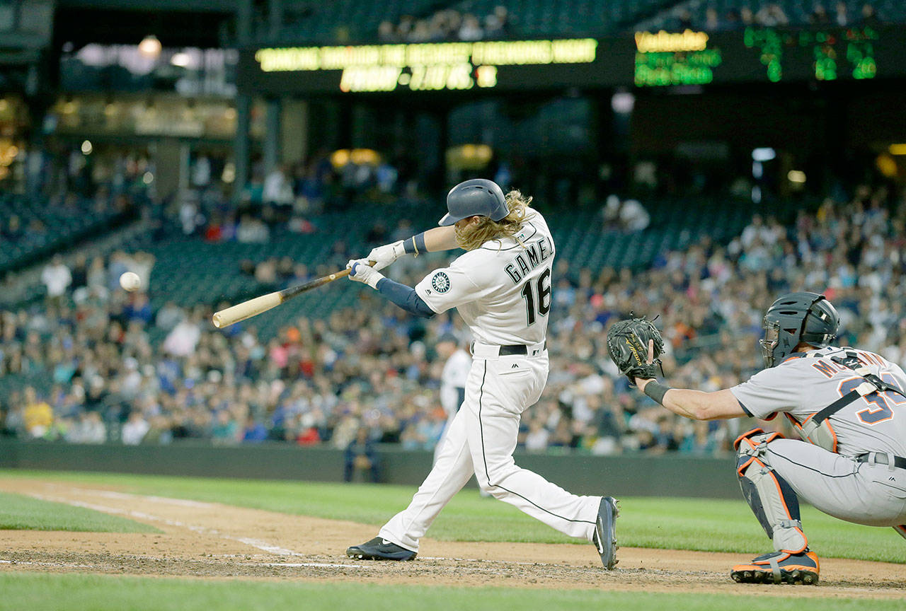 Seattle’s Ben Gamel connects on an RBI single to drive in Jarrod Dyson in the sixth inning of the Mariners’ 7-5 win overDetroit on Wednesday in Seattle. Gamel’s run-scoring hit was part of a late rally that sprang from nowhere after theTigers’ Justin Verlander was perfect through the first five frames against the M’s, who clinched the series with the win. (AP Photo/Ted S. Warren)