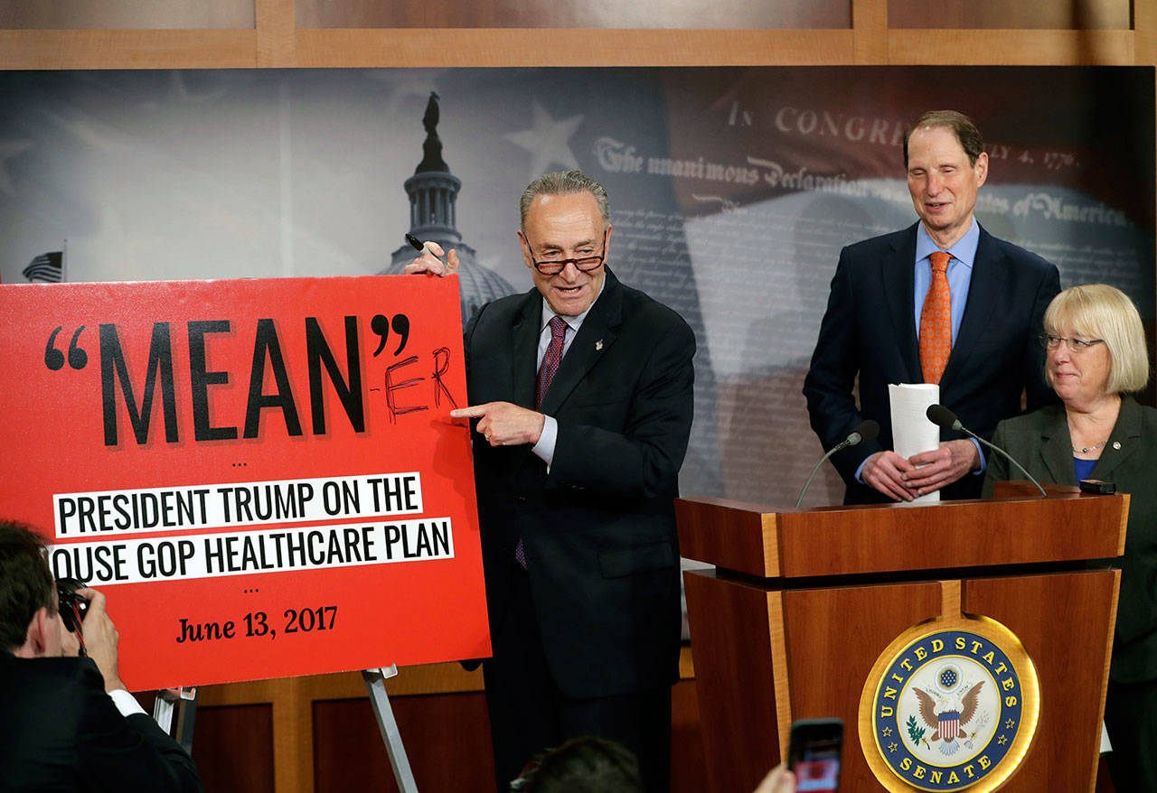 Senate Minority Leader Chuck Schumer, D-New York, joined by Sen. Patty Murray, D-Washington, and Sen. Ron Wyden, D-Oregon, responds to the release of the Republicans’ health care bill, which represents the attempt to scuttle much of President Barack Obama’s Affordable Care Act, at the Capitol in Washington, Thursday. (Associated Press)