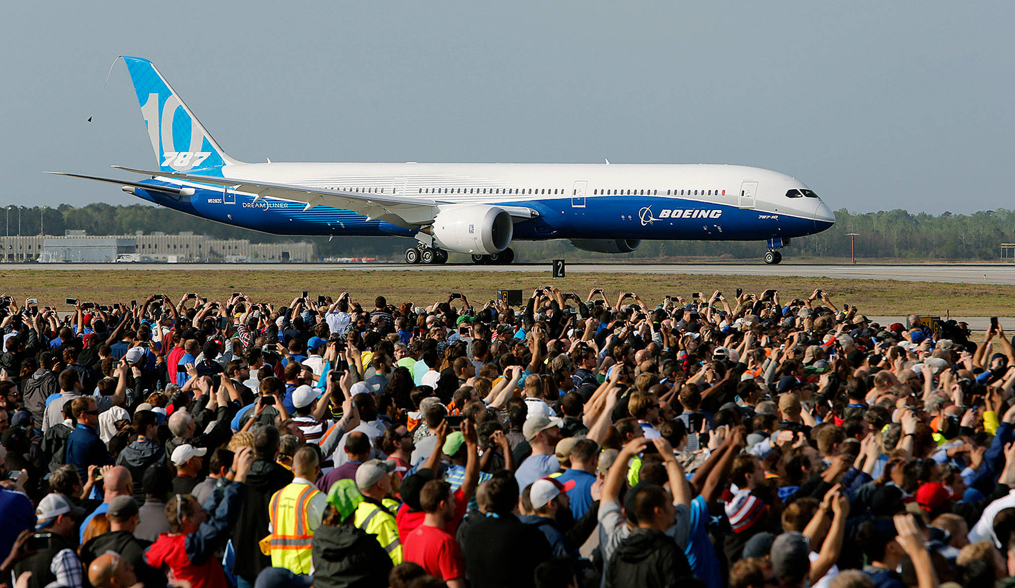 A Boeing 787-10 Dreamliner taxis down a runway — not a “tarmac” — as it gets ready for its first test flight on March 31 in South Carolina. (AP Photo/Mic Smith)