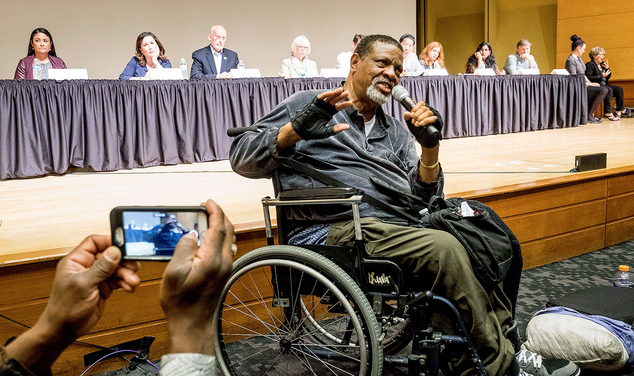 Charles Lyles, Charleena Lyles’ father, speaks of the impact of her death on his family on Tuesday. Residents and family members demanded change from Seattle officials during a City Council hearing about her fatal shooting by police earlier this month. (Dean Rutz/The Seattle Times via AP)