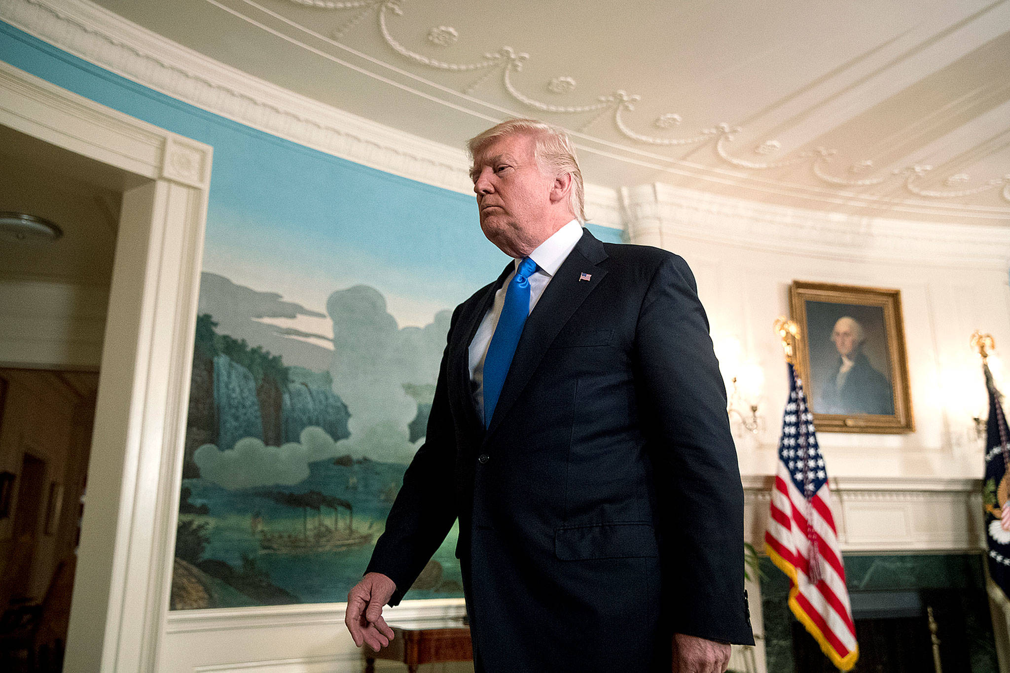 President Donald Trump departs the Diplomatic Room of the White House in Washington on Wednesday after talking about the shooting in Alexandria, Virginia. (AP Photo/Andrew Harnik)