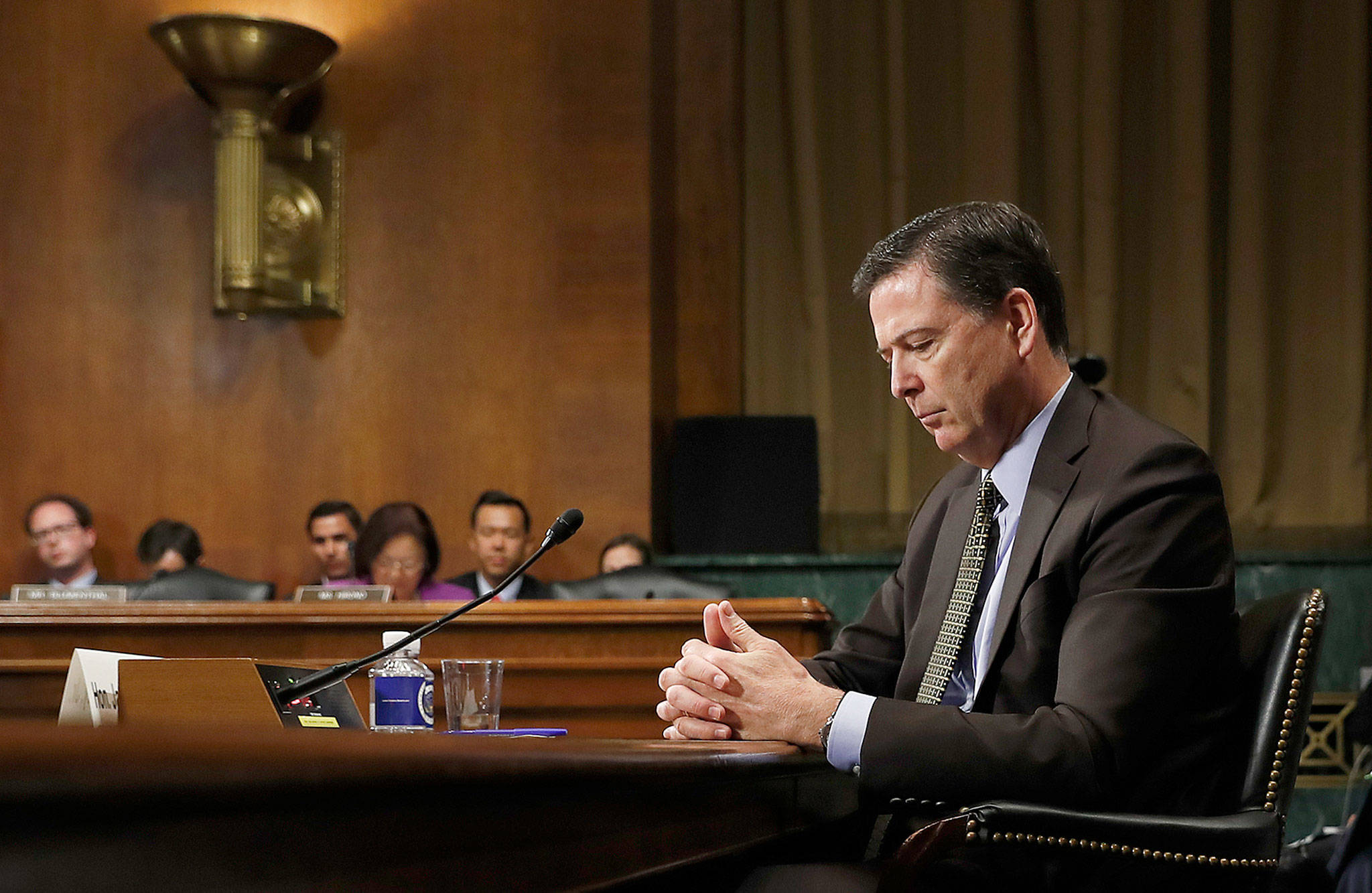 Then-FBI Director James Comey pauses as he testifies on Capitol Hill in Washington before the Senate Judiciary Committee on May 3. (AP Photo/Carolyn Kaster)