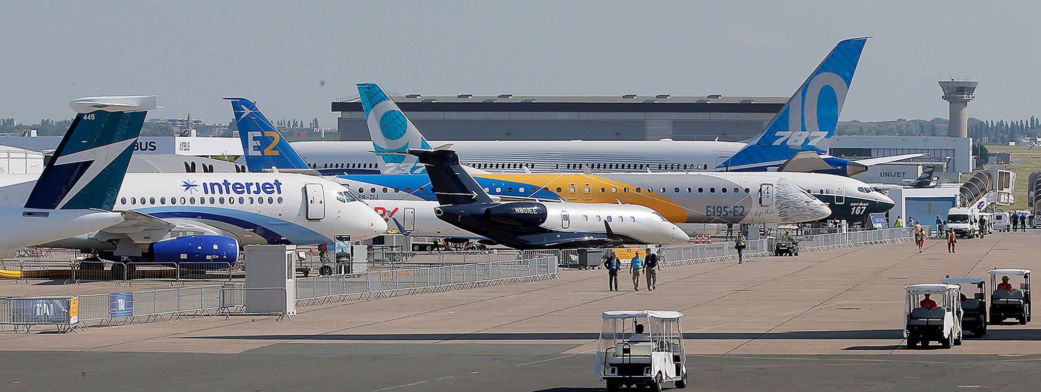 Aircraft on display at the Paris Air Show in Le Bourget, east of Paris, France, include a Boeing 787-10 and a 737-9. (Michel Euler / Associated Press)