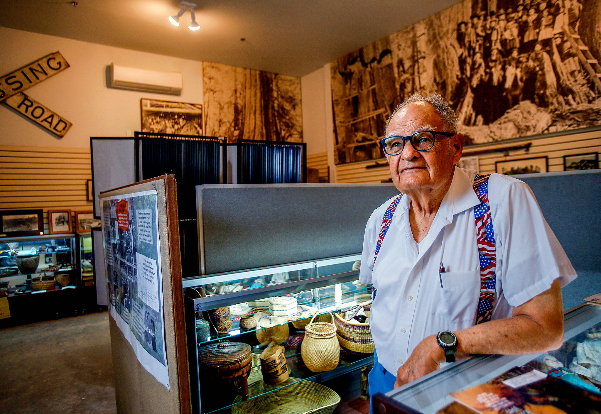Ken Cage has good reason to be proud Friday as he and others prepare to open the new Marysville Historical Society’s museum to the public. (Dan Bates / The Herald)