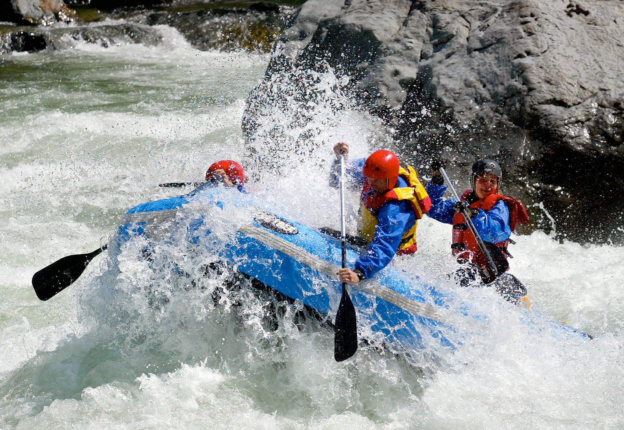 Rafters enjoy a sunny day riding the spring melt through Boulder Drop on the Skykomish river near Index. A countywide effort is underway to promote and enhance water trails to the Skykomish, Snohomish and Snoqualamie rivers. (Michael O’Leary / Herald file)