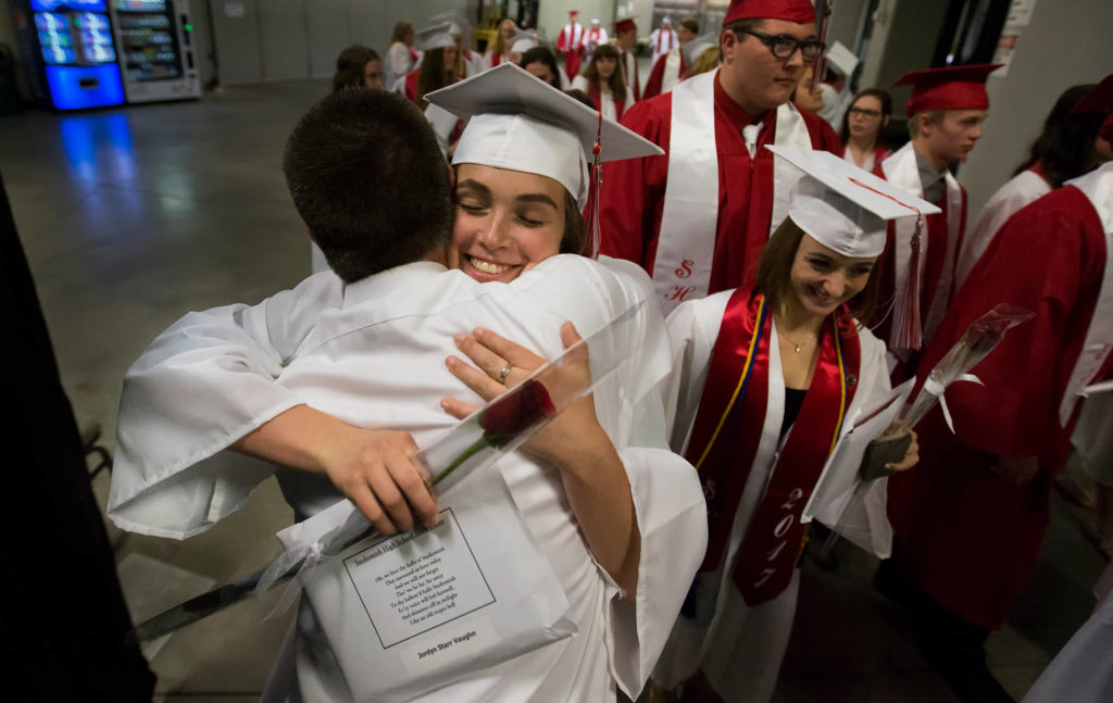 Snohomish and Glacier Peak high schools of Snohomish held their graduation ceremony at Xfinity Arena on Monday in Everett. (Andy Bronson / The Herald)
