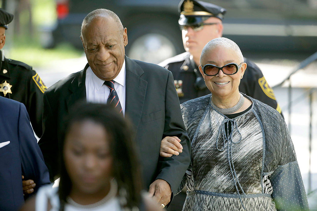 Bill Cosby arrives for his sexual assault trial with his wife, Camille Cosby (right), at the Montgomery County Courthouse in Norristown, Pennsylvania, on Monday. (AP Photo/Matt Rourke)