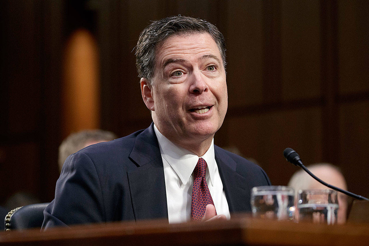 Former FBI director James Comey recounts a series of conversations with President Donald Trump as he testifies before the Senate Select Committee on Intelligence, on Capitol Hill in Washington, Thursday, June 8, 2017. Comey alleges Trump repeatedly pressed him for his &ldquo;loyalty&rdquo; and directly pushed him to &ldquo;lift the cloud&rdquo; of investigation by declaring publicly the president was not the target of the probe into his campaign&rsquo;s Russia ties. (AP Photo/J. Scott Applewhite)