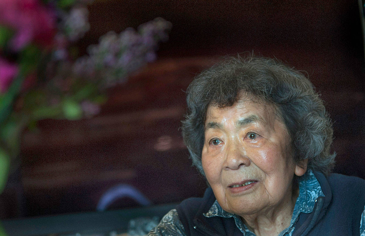 Jeanne Tanaka talks about her time in an internment camp reserved for “disloyal” Japanese-Americans. For Tanaka, now 93, internment started earlier. Police came for her father one January day while he was working in the pea fields on their farm in Auburn. They took him away with no explanation. (Kathy Plonka / The Spokesman-Review)
