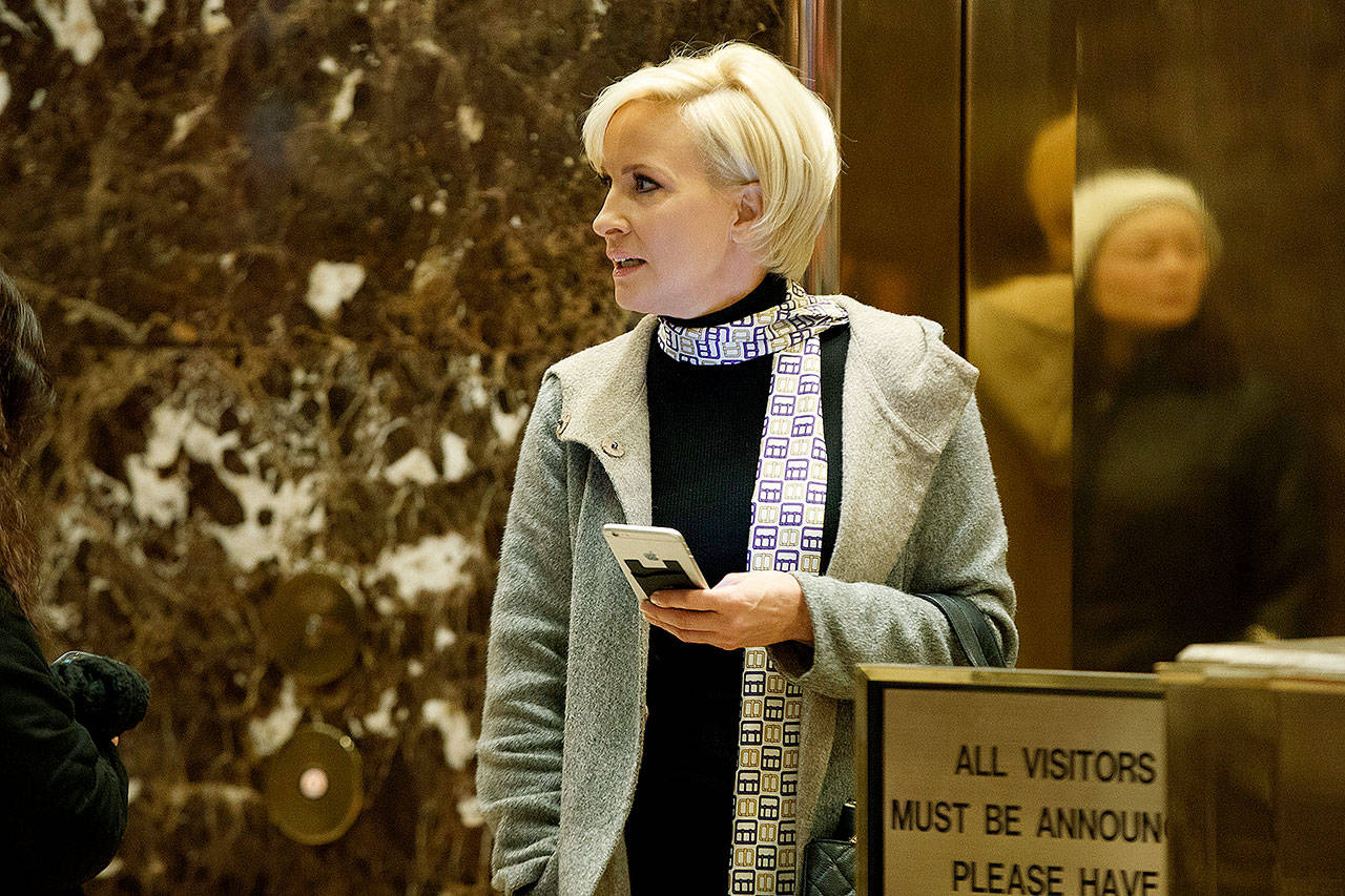 Mika Brzezinski waits for an elevator in the lobby at Trump Tower on Nov. 29, 2016, in New York. (AP Photo/Evan Vucci)